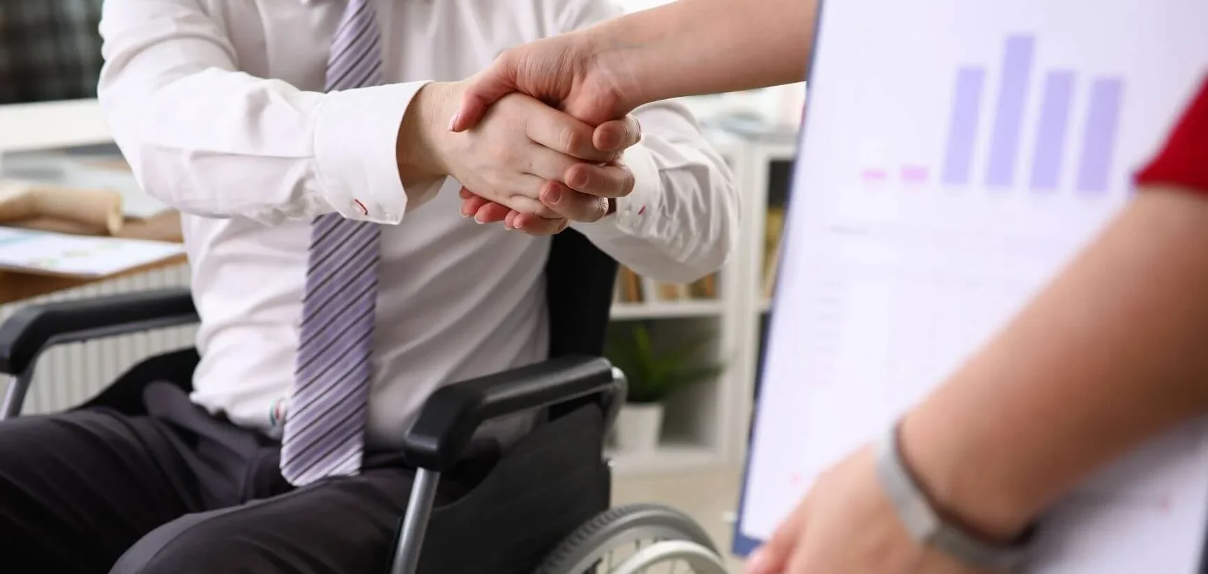 Header Image - Begrüßung des Patienten im Rollstuhl